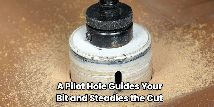 A Pilot Hole Guides Your
Bit and Steadies the Cut