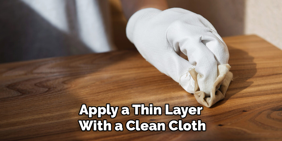 Apply a Thin Layer 
With a Clean Cloth