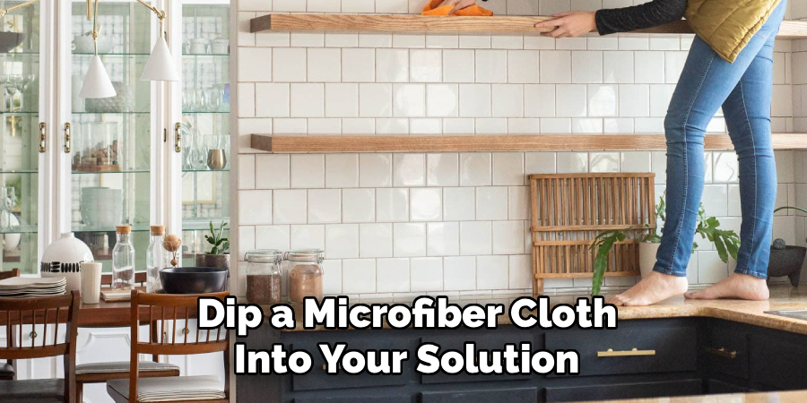Dip a Microfiber Cloth
Into Your Solution