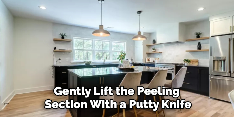 Gently Lift the Peeling
Section With a Putty Knife
