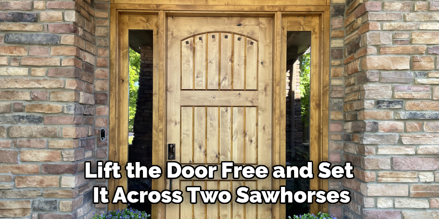 Lift the Door Free and Set 
It Across Two Sawhorses