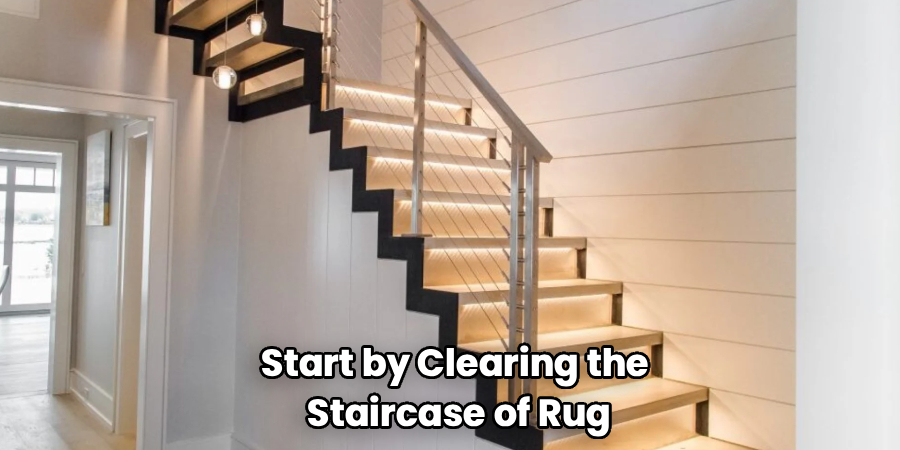 Start by Clearing the
Staircase of Rug