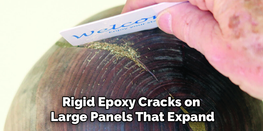 Rigid Epoxy Cracks on 
Large Panels That Expand